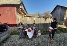 BUCURIE DE NEDESCRIS: Sindicaliștii de la SNPR Decus au adus zâmbete pentru șase copii ai unei familii nevoiașe