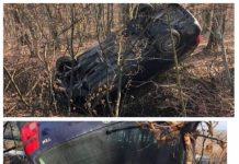 GALERIE FOTO: Un șofer și-a ”parcat” mașina pe plafon în pădurea de lângă Tulghieș
