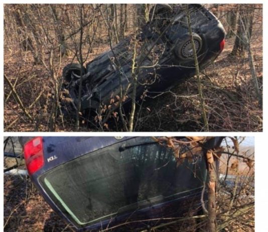 GALERIE FOTO: Un șofer și-a ”parcat” mașina pe plafon în pădurea de lângă Tulghieș