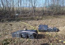 FOTO: CRĂCIUNEȘTI – Contrabandiști fugăriți cu focuri de armă din România în Ucraina. Țigările aruncate în râul Tisa